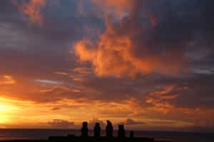 Watch the sunset on the moai of Ahu Tahai