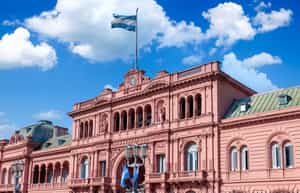 See the balcony where Evita spoke at Casa Rosada