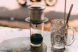 Drink Vietnamese coffee at a local cafe in Hanoi