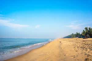 Visit the soft sandy shores of Marari Beach