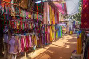 Shop for local crafts at Anjuna Market in Goa