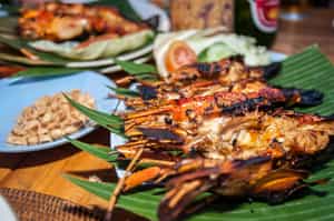 Take an evening out to Jimbaran Bay for dinner