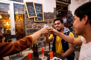 Have a drink at a traditional bar in Lima