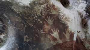 See prehistoric fingerprints in an ancient cave