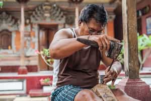 Visit local wood carvers and artisans in Ubud