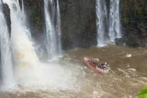 Take a boat ride to Devil's Throat, Iguazu Falls