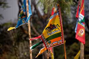 Witness prayer flag hoisting at Dochu La mountain
