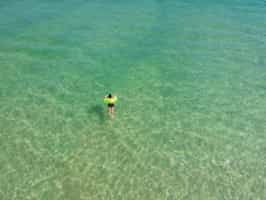 Swim in the crystal clear waters of Corumbau