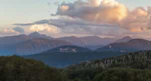 Soak in the sunset from the slopes of Mocho Choshuenco volcano
