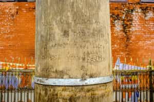 See the historic Ashokan Pillar in Lumbini