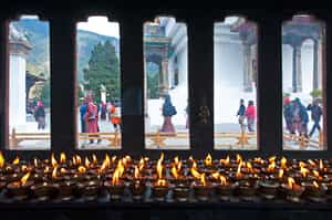 Participate in the Butter lamp offering and blessing at 7th century Kyichu Lhakhang