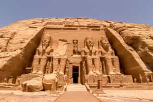 See the temples at Abu Simbel in Aswan