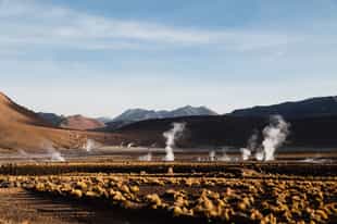 Walk among spurting geysers at El Tatio in Atacama