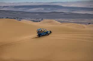 Soar across the Paracas dunes in a sand buggy