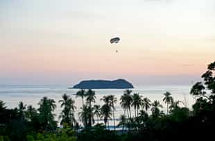 Parasail above the pacific ocean in Manuel Antonio