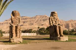 Stand next to the great Colossi of Memnon, Nile