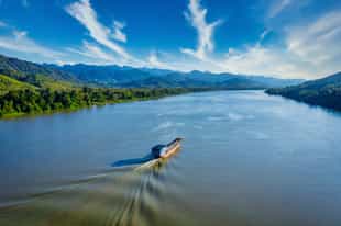 Take a boat cruise down the Mekong River