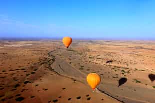 Drift over the desert near Marrakesh in a balloon
