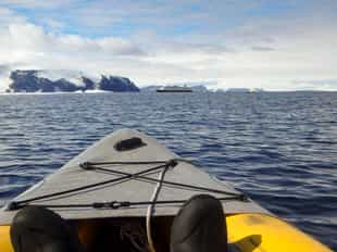 Kayak in the open waters of Antarctica