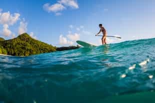 Take in the Seychelles views paddling on a SUP