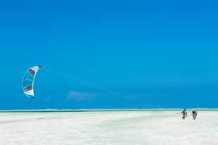 Kite surf along the coast outside Stone Town