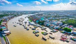 Visit Cai Rang Floating Market in the Mekong Delta