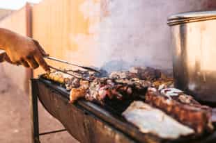 Celebrate local culture with a classic asado roast