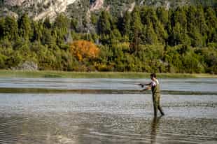 Go fly fishing in the fjords of Puerto Natales