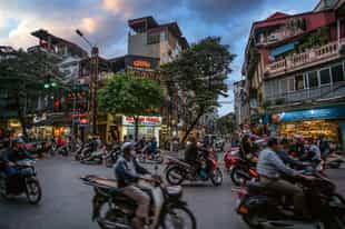 Explore the streets of Hanoi by vespa
