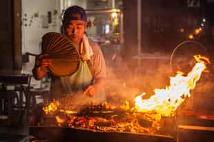 Go on a street food tour in Halong Bay