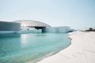 Admire exhibitions of the Louvre Abu Dhabi Museum