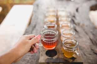 Try the local drinks at a cafe in Lima