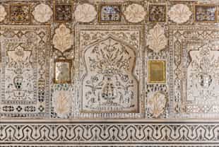 See the intricate mirror work of the Sheesh Mahal