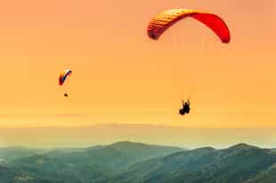 Enjoy views of the coffee region on a paraglide
