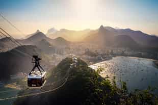Take a cable car up Sugar Loaf Mountain, Rio