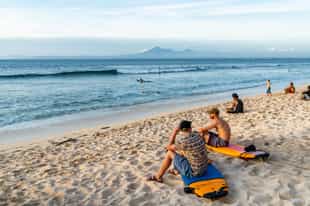 Take on the waves on a surfing lesson in Jimbaran