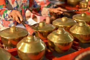 Attend a performance of traditional gamelan music