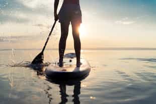 Go stand up paddle boarding around Príncipe