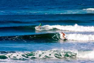 Take on the waves surfing in Tofo, Inhambane