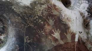 See prehistoric fingerprints in an ancient cave
