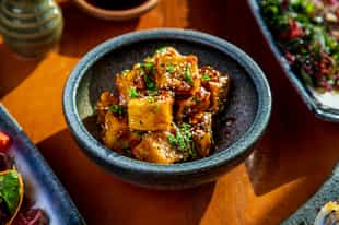 Try out tofu at a restaurant in Tokyo