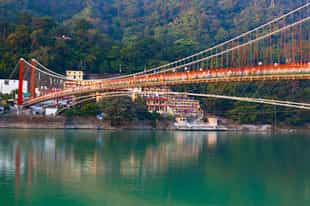 Visit the Ram Jhula bridge in Rishikesh