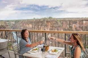 Enjoy dinner at The Lookout Cafe in Victoria Falls