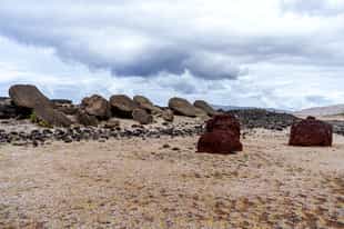 View a variety of toppled Moais of Ahu Vaihu