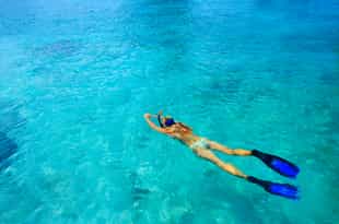 Snorkel in Galapagos islands crystal waters