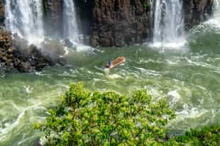 Go on a motorboat ride to the Iguazu waterfall