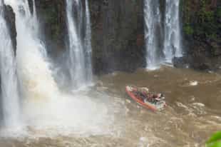 Take a boat ride to Devil's Throat, Iguazu Falls