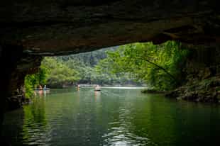 Explore the Tam Coc grottoes of Ninh Bihn by boat