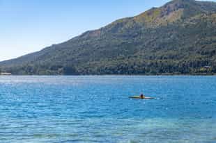Paddle across the crystal-clear waters of Lake Moreno