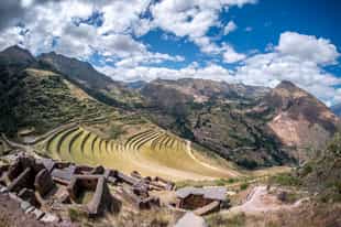 Explore the Incan ruins of Pisac in the Sacred Valley